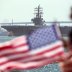 The USS Ronald Reagan, a Nimitz-class nuclear-powered super carrier, is followed by the USS Somerset as it departs for Yokosuka, Japan from Naval Station North Island in San Diego, California August 31, 2015. REUTERS/Mike Blake