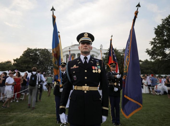 A U.S. military color guard stands on the White House South Lawn after U.S. President Donald Trump hosted a 4th of July "Salute to America" to celebrate the U.S. Independence Day holiday at the White House in Washington, U.S., July 4, 2020. REUTERS/Carlos