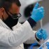 A laboratory technician of biotechnology company mAbxience is seen working, amid the outbreak of the coronavirus disease (COVID-19), in Buenos Aires, Argentina August 13, 2020. REUTERS/Agustin Marcarian